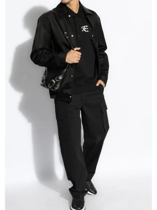 GIVENCHY Polo-style sweatshirt in brushed fabric with medal.